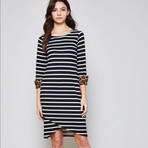 Striped dress featuring cuff sleeves
